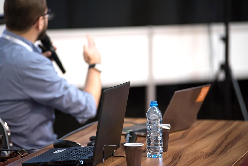 Modern productive workspace with organized desk setup, ergonomic chair, and optimal lighting