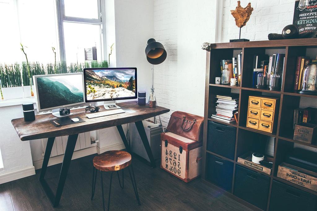 Ergonomic modern office desk with smart gadgets and organized setup